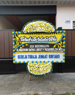 Papan Bunga Duka di Giriharjo